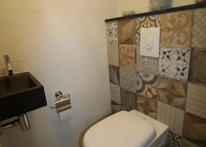 Am Mit Kamin & Sauna - Seestern 251 Юлианадорп